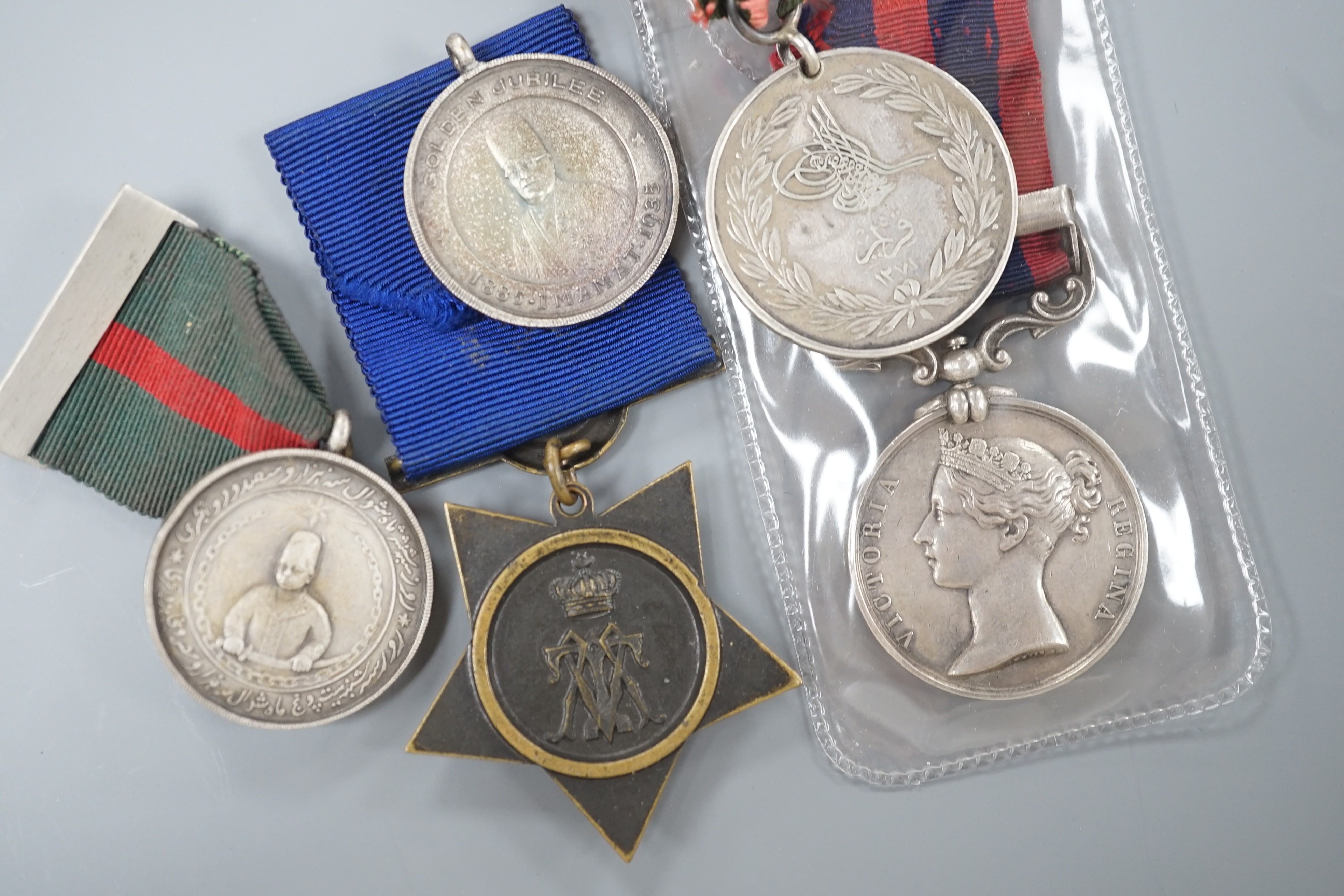 An India GSM with Burma 1885-7 clasp to 1167 Clr. Sergt. Doidge (or Dadge) 2d. Bn. L’pool R. together with a Turkish medal for the Crimean war and a Khedive’s bronze star (1882)